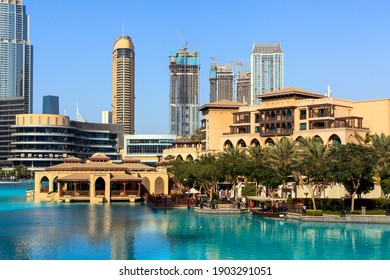 Landscape View Of Building With Lake View With Under Construction Building With Sky Scraper Buildings.