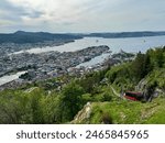 Landscape view in evening at Floibanen, Bergen, Norway; Red cable car go to view point.