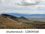 Landscape view of fields and a mountain range in montana