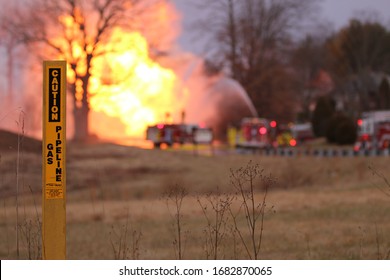 Landscape View Of A Fire That Resulted From A Natural Gas Line Rupture And Explosion Being Held In Control By Local Fire Departments