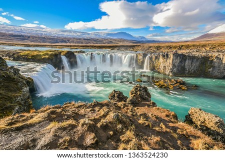 Landscape View Of Godafoss Waterfall Under Clear Blue Sky On Skjalfandafljot River, Northern Region of Iceland