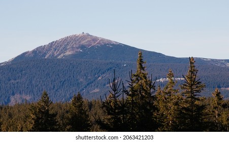 Landscape view of highest mountain in Czech Republic, Snezka, Krkonose, from Cerna hora mountain on a sunny autumn day - Shutterstock ID 2063421203