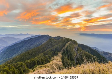 Landscape View Of The Holy Ridge And Nanhu Zhongyangjian Mountain With Amazing Sunriset On The Peak Of Tao Mountaion, Wuling Quadruple Mountains Trail, Shei-Pa National Park, Taiwan