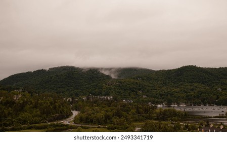 Landscape view mist on the mountains Quebec City in the summer - Powered by Shutterstock