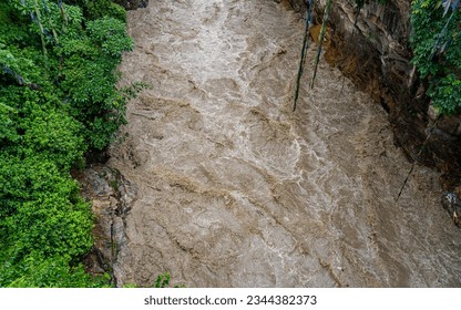 Landscape view of monsoon flooding Bagmati river in Kathmandu, Nepal.  - Shutterstock ID 2344382373