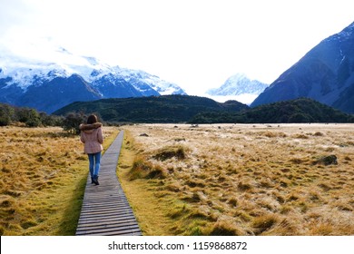 Landscape View Mountain And Wood Road To The Mountain With Brown Filed In Autumn At Aroki Mt.cook