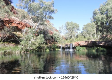 Landscape View Of A Natural Waterfall And A Pool In Pilbara Western Australia. No People. Copy Space