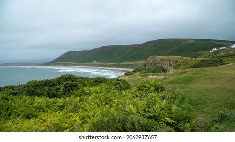 A landscape view of Rhossili Bay, The Gower, Wales, UK