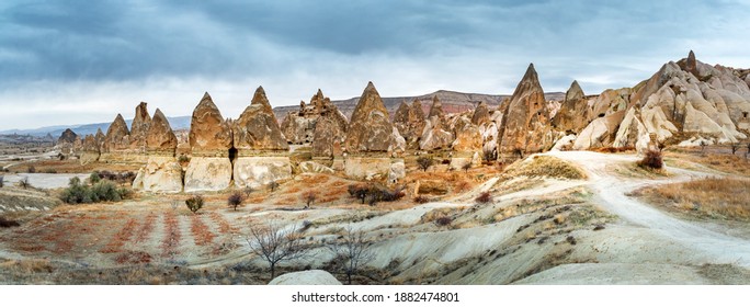 Landscape View Of Unesco World Heritage, Cappadocia, Turkey Under Cloudy Sky