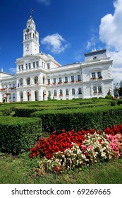 Landscape view of the white Town Hall building of  Arad