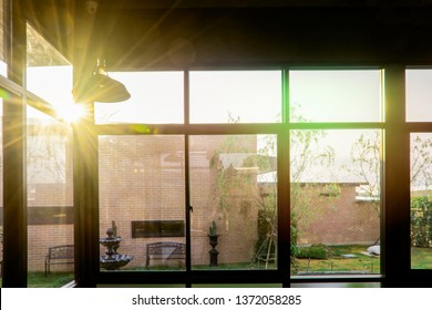 Landscape view from the window for relaxing time, green nature beside the window, coffee bar, peaceful place for take a rest in the morning, Flare light through the window in the morning - Powered by Shutterstock