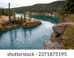 Landscape views of Miles Canyon, located just outside of Whitehorse, Yukon.  The Yukon River is pictured, this was a route utilized during the Klondike Gold Rush. 
