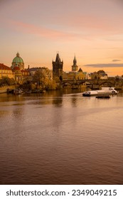 landscape with Vltava river, Karlov most and boat at sunset in autumn in Prague, Czech Republic. - Shutterstock ID 2349049215