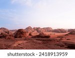 Landscape - Wadi Rum, Jordan. A beautiful vibrant sunset, Arabian desert, a dystopian martian landscape with unique rock formations and dunes. Backdrop for graphic resource or copy space