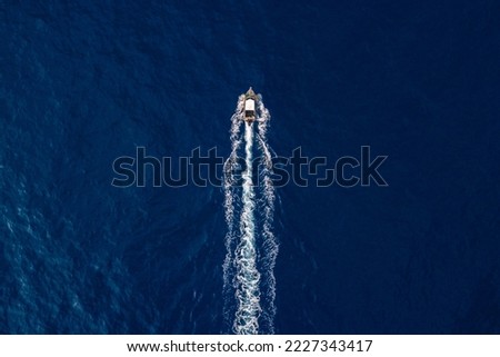 Aerial view of small boat in sea