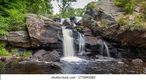 Landscape With Waterfall, Rocks And Leafy Green Trees At Eightmile River , Chapman Falls, East Haddam, Connecticut Devil's Hopyard State Park