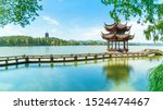 Landscape of West Lake（xihu）Hangzhou. Long Bridge and Leifeng Pagoda.the chinese word in photo means"Xiyingting pavilion". Located in Hangzhou City, Zhejiang Province, China.
