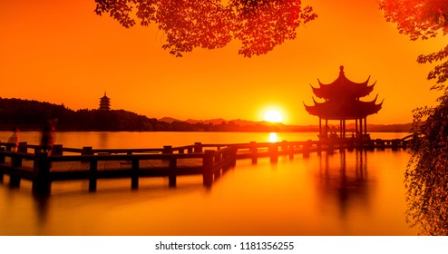 Landscape of West Lake（xihu）Hangzhou. Long Bridge and Leifeng Pagoda.the chinese word in photo means"Xiyingting pavilion". Located in Hangzhou City, Zhejiang Province, China - Powered by Shutterstock