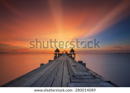 Landscape of Wooded bridge in the port and sunrise