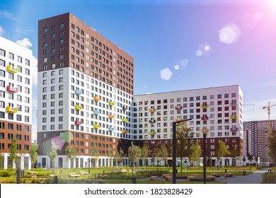 Landscaped courtyard in residential complex. Modern apartments. High-rise buildings