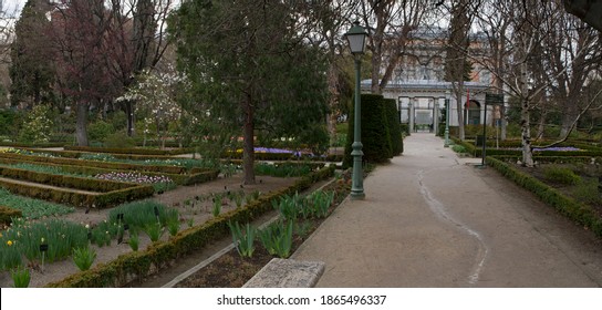 Landscaping and garden design. Panorama view of the plants, trees, Buxus sempervirens flower beds, flowers and pathwalk across the Royal Botanic Garden of Madrid, Spain. - Shutterstock ID 1865496337