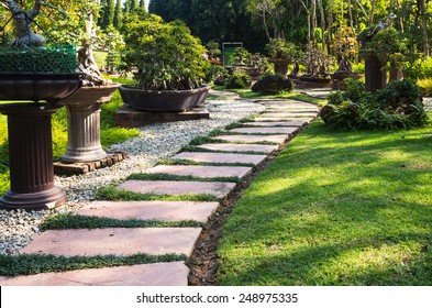 Landscaping in the garden. The path in the garden. - Powered by Shutterstock