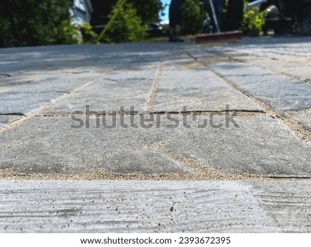 Landscaping work, jointing polymeric sand