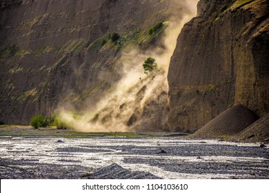 Landslide Next To A Mountain River Bed