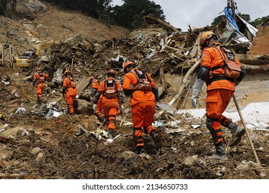 Landslide in Petropolis city,  natural disaster destroyed house, mud and debris. Firefighters teams working search and rescue for victims of rain at Morro da Oficina. Rio de Janeiro, Brazil 02.25.2022