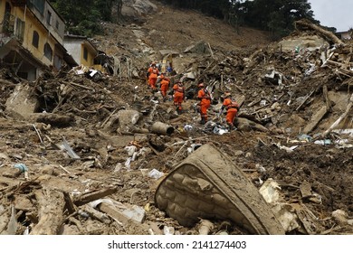 Landslide In Petropolis City,  Natural Disaster Destroyed House, Mud And Debris. Firefighters Teams Working Search And Rescue For Victims Of Rain At Morro Da Oficina. Rio De Janeiro, Brazil 02.25.2022