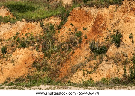 Landslide zone on Black Sea coast. Zone of natural disasters during rainy season. Large masses of earth slip along slope of hill, destroy houses. Landslide - threat to life
