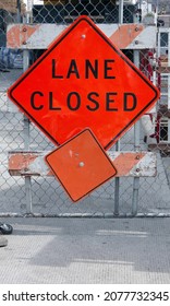 LANE CLOSED Traffic Sign And Street Barrier