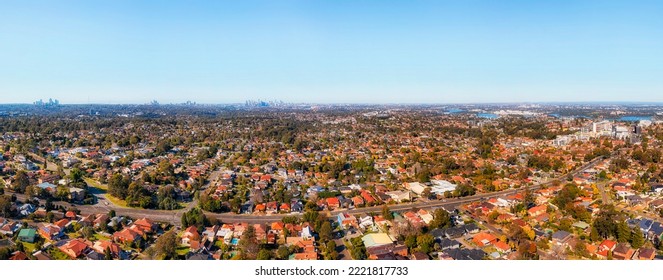 Lane Cove Road Aerial Panorama Of Western Sydney From City Of Ryde To Distant CBD High-rise Towers On Horizon Skyline.