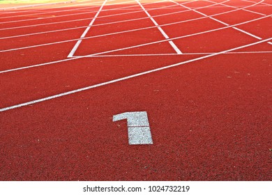 lane number one for sprinters in an athletics stadium
