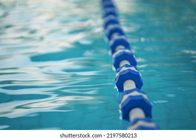 Lanes Of A Competition Swimming Pool Blur. Empty Swimming Pool With Lanes