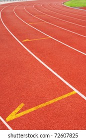 Lanes of red running track