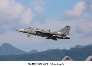 Langkawi, Malaysia - Mar 29, 2019. India Air Fore HAL Tejas fighter jet taxiing on runway of the Langkawi Airport (LGK).
