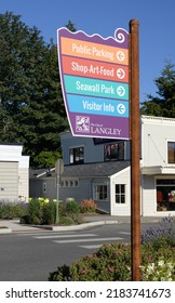 Langley, WA, USA - July 26, 2022; Sign Post In Langley Washington With Information On Tourist Directions