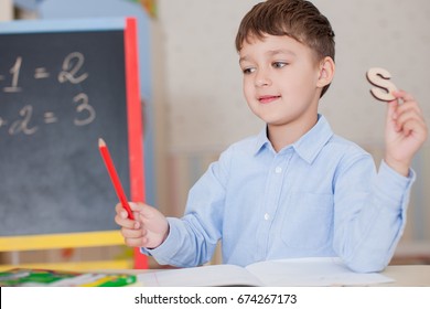 Language Learning. Education concept. Curious Child Learns a foreign Language