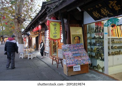 Langzhong, Sichuan  China - December 06 2021: A Souvenir Shop In LangZhong Selling CCP's Leader Mao Zedong's Poster. 