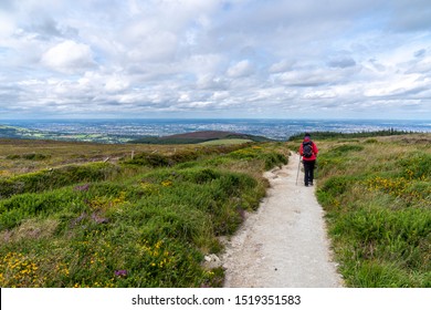 Lanscape of Wicklow way with a girl in the way and Dublin in the background, County Dublin, Ireland.