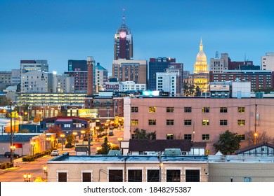 Lansing, Michigan, USA downtown city skyline at twilight.