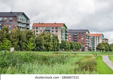 Lansingerland, The Netherlands, August 29, 2020: Colorful Group Of Apartment Buildings On The Edge Of Annie M.G. Schmidt Park