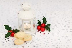 Lantern, Holly And Mince Pies On Starry Background