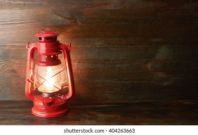 Lantern Kerosene Oil Lamp, On Wooden Background