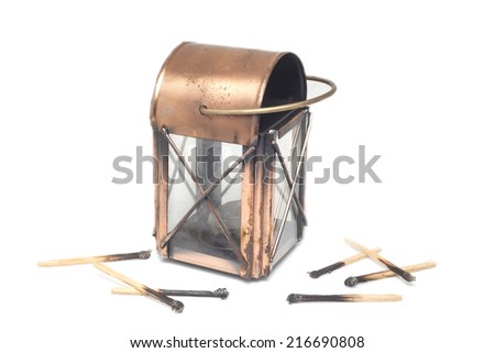 Lantern and match on isolate