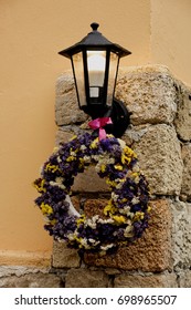Lantern on a brick wall