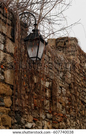 Lantern on a stone wall