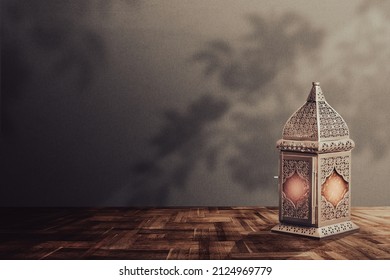 A lantern is placed on a wooden table with a beautiful background for the Muslim feast of the holy month of Ramadan Kareem. - Shutterstock ID 2124969779