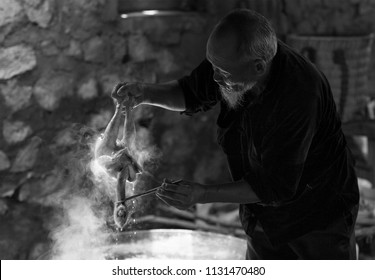 Lao Cai, Vietnam June 11, 2016: A Chef Is Cooking Food, Boiled Chicken. He Is An Ethnic Minority In Y Ty, Lao Cai, Vietnam.